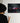 Person looking at a Formula 1 car painting on a wall